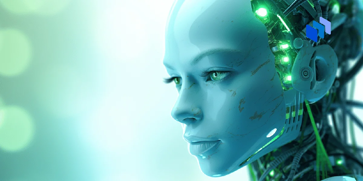 An android robot looking at a screen