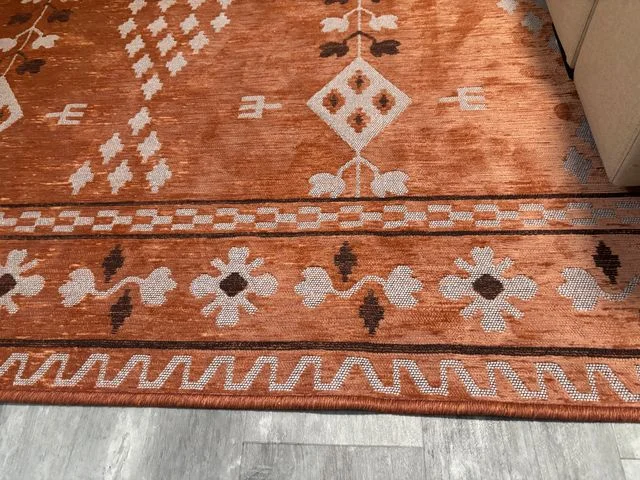 Image may contain: Home Decor, and Rug