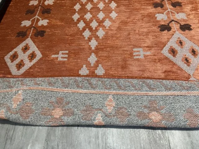 Image may contain: Home Decor, and Rug