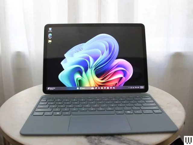 Image may contain: Computer, Electronics, Laptop, Pc, Tablet Computer, Computer Hardware, and Hardware