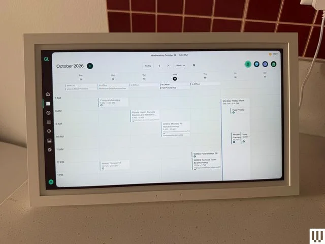 Small digital screen on top of a countertop showing a calendar