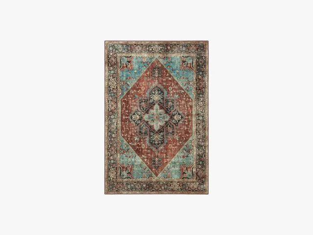 Brown, teal, and red rug with ornate geometric patterns