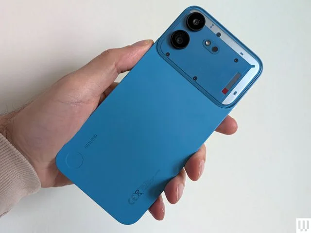 Backside of a slim blue mobile phone