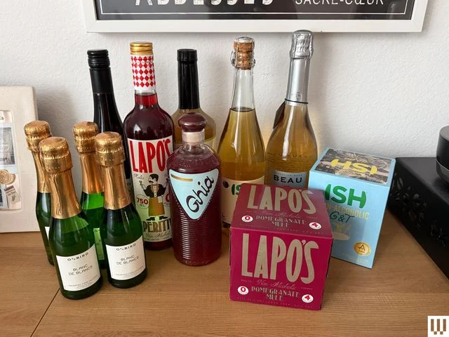 Bottles and small packaging boxes on a brown table