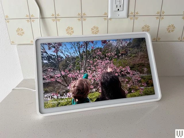Image may contain: Adult, Person, Photography, Child, Electronics, Screen, Clothing, Glove, Computer Hardware, and Hardware